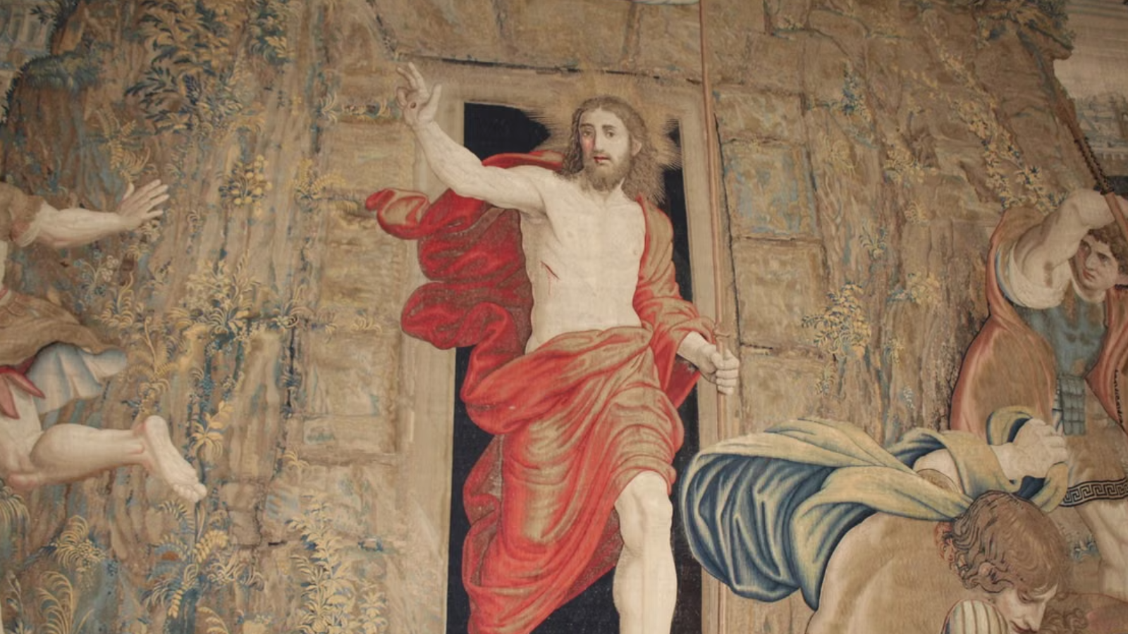 Een schildering van Jezus aan de muur