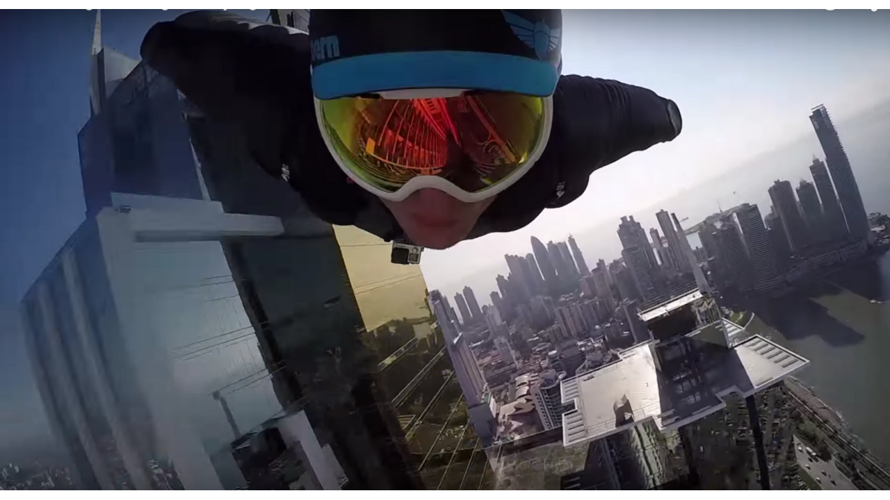 Illustratie voor: Twee gasten vliegen met een wingsuit door Panama City en filmen het met een GoPro