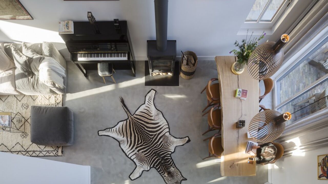 Illustratie voor: Nederlandse architecten ontwierpen dit industriële huis in Amsterdam Noord!