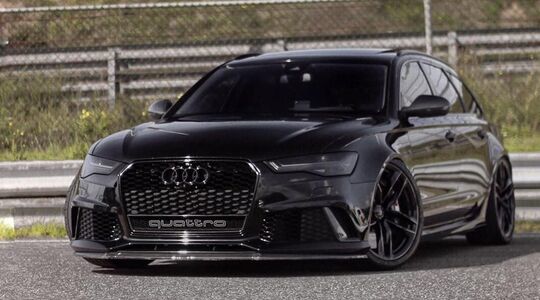 Illustratie voor: Check hoe de gruwelijke Audi RS6 over het circuit van Zandvoort scheurt