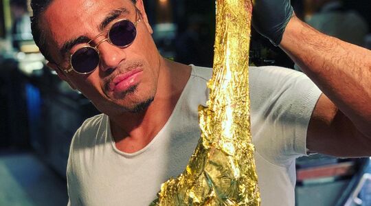 Golden Tomahawk steak Salt Bae