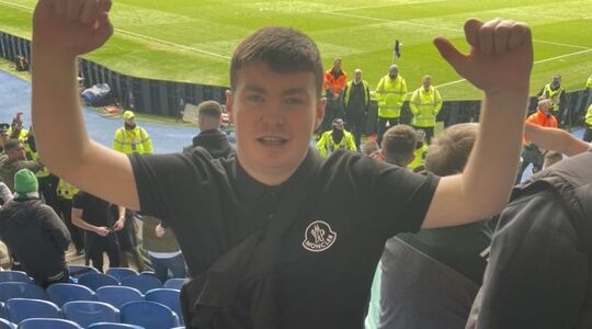 Fan Celtic tijdens Old Firm