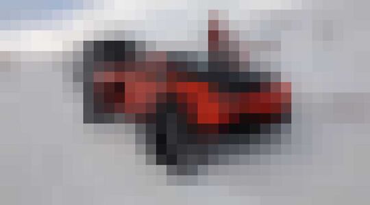 Lamborghini Adventador op rupsbanden