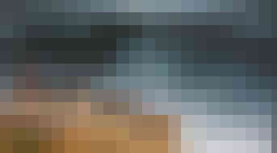 Illustratie voor: Man pakt golf van 23 meter en zet record voor hoogste golf in Guiness Book of Records